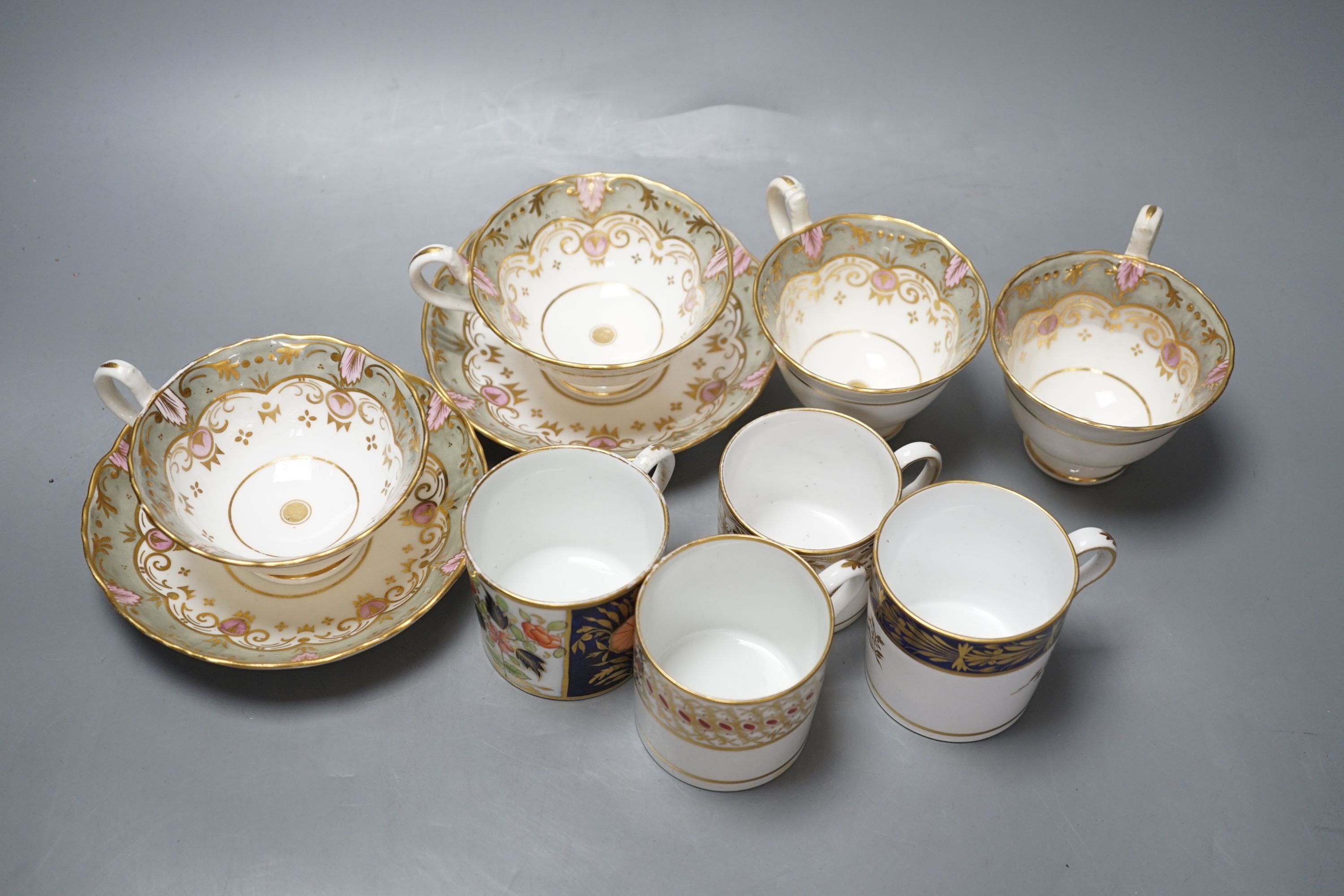 Four Regency porcelain coffee cans and a pair of trios (8)